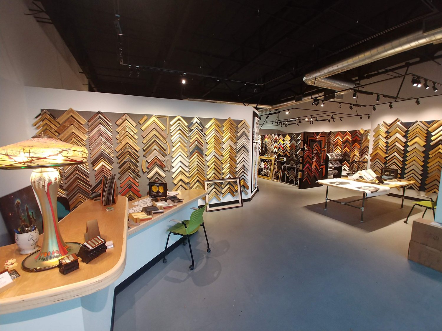 Inside the Image & Frame Old Town Scottsdale showroom with frame samples displayed on the walls