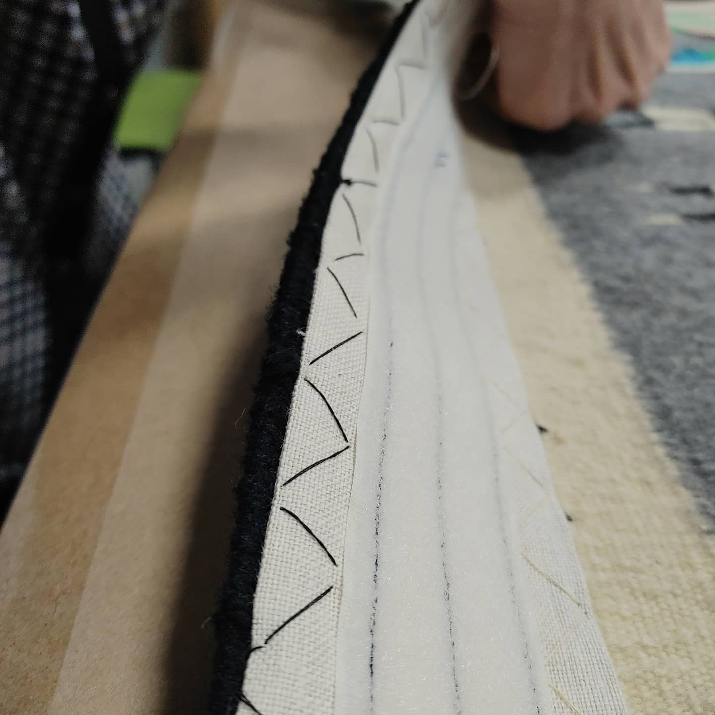 Detail of textile mounting work