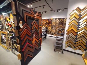 Leather picture frames. Some 20th century picture frames on the right.